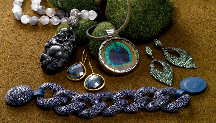 Jewelry trends in the shades of the season: designs in Labradorite, Shagreen and Tsavorite. 
One of a kind Buddha necklace, Peacock feather pendant by Presh, Pave Tsavorite earrings, Labradorite drop earrings by Coralia Leets, Shagreen link bracelet with a magnetic clasp.