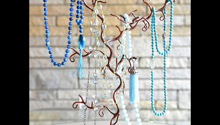 Tassels, beads and medallions looks great with a T-shirt, tunic or spring dress. 